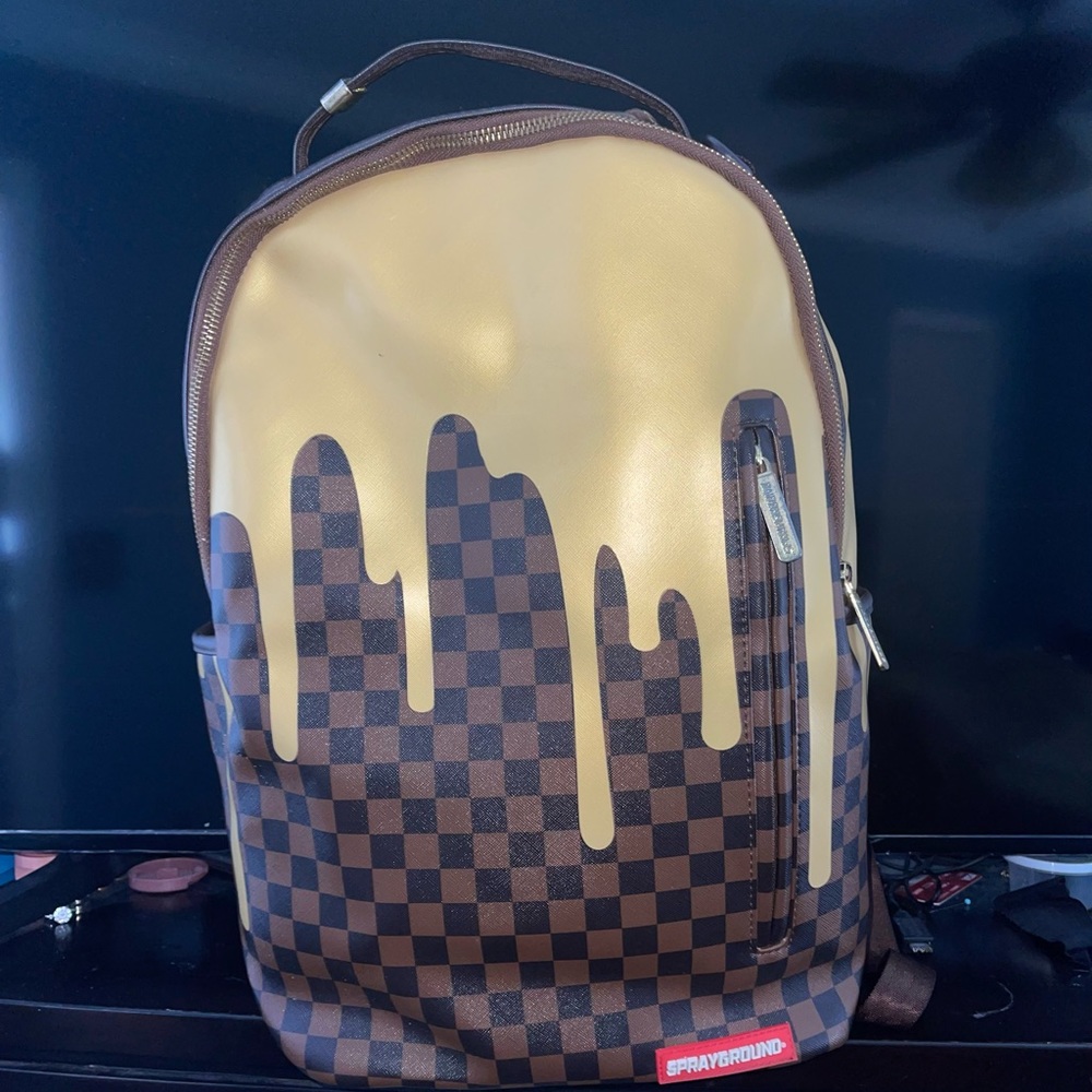 new gold drip sprayground